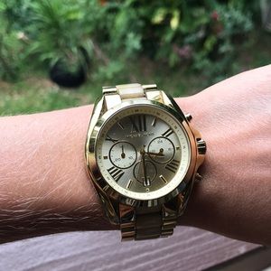 Michael Kohrs gold and cream watch